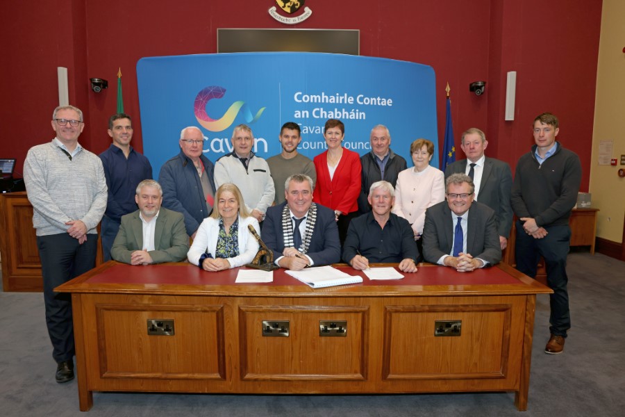 Pictured at Courthouse Cavan, signing contracts for the development of 13 social homes in Kilnaleck are (back row, left to right): John Wilson, Senior Engineer, Cavan County Council Housing Construction; Enda Gilsenan, Wynne, Gormley, Gilsenan Architects; Deputy Brendan Smith TD; Cllr Trevor Smith; Niall McGaughran, Crosserlough Construction; Deputy Pauline Tully TD; Cllr Noel Connell; Phyllis Boylan, GV Maloney Solicitors; Cllr Winston Bennett; Brendan McGourty, Executive Engineer, Housing Construction. Front row, left to right: Jonathan Condell, Senior Executive Engineer; Jacqueline Maloney, GV Maloney and Co Solicitors; Cathaoirleach, Cllr TP O’Reilly; Jim McGaughran, Crosserlough Construction; Chief Executive of Cavan County Council, Eoin Doyle. PHOTO: Adrian Donohoe.